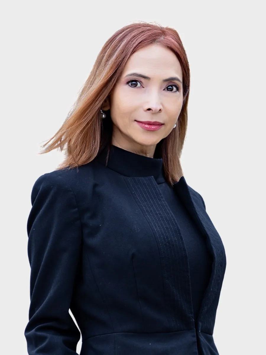 Lena Vo, President of Winvo Realty, standing outdoors in Austin, Texas